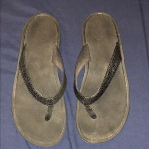 Women’s black Olukai sandals